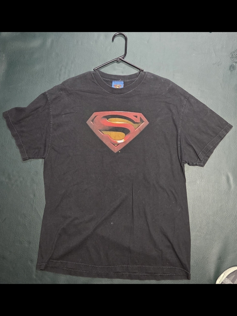 **DC Comics Black Tee with Red and Yellow Superman Shield**